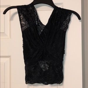 A black lace crop top